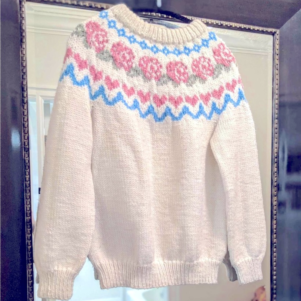 Adorable handmade sweater with rose details
